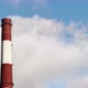 Steam From Pipes of a Thermal Power Plant Over Winter the City Blue Sky and Sun - VideoHive Item for Sale