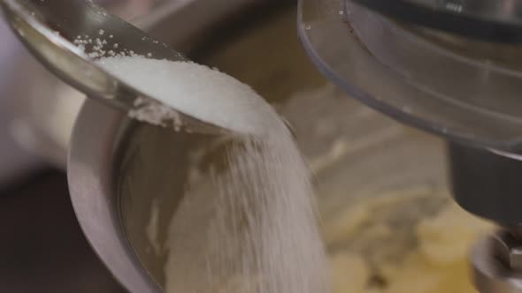 Closeup of Butter and Sugar Being Whipped in a Food Processor