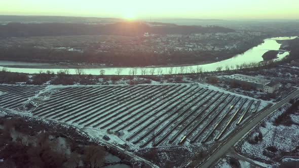 Blue Solar Photo Voltaic Panels System Producing Renewable Clean Energy in Rural Area in Winter
