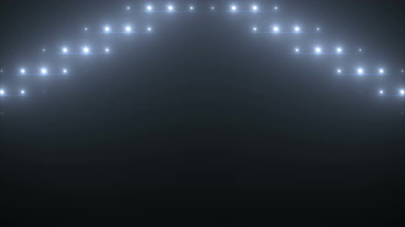 Bright stage lights flashing. White flashing lights wall alt