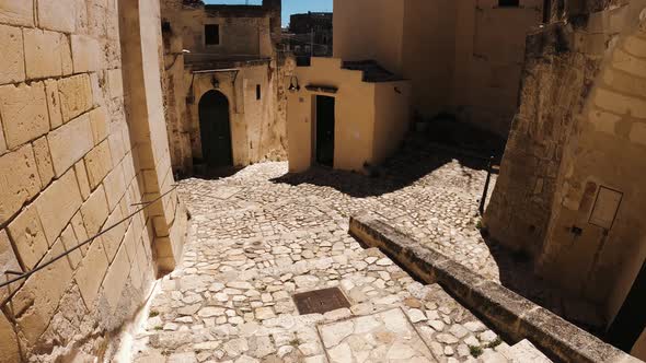 View of a narrow alley in the city of Matera, Italy