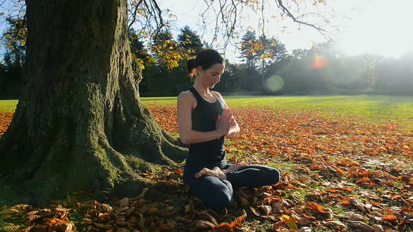 Woman in Yoga Lotus Pose