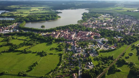 Aerial view of a small historic town of Trebon surrounded by protected landscape area with a muddy p
