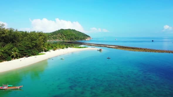 Aerial tourism of paradise lagoon beach lifestyle by blue sea and white sandy background of a dayout