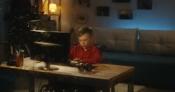 Disabled Boy Using Computer