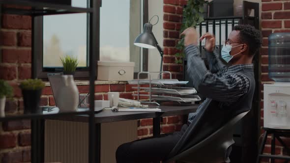 African American Man Relaxing on Break After Finishing Commercial Work