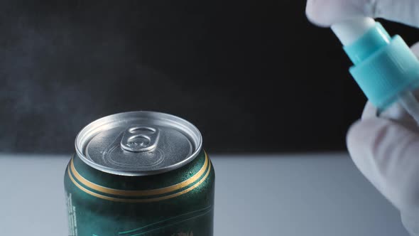 Spraying by Alcohol Sanitaizer to drink in aluminum Beer can, due Antibacterial protection