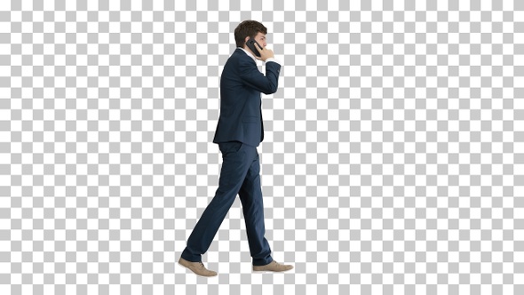 Young businessman talking on the phone while walking, Alpha Channel