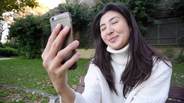 Slow Motion Young Asian Business Woman Looking at Camera or Webcam Talking for Online Job Interview