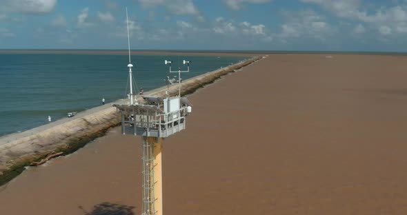 Aerial view of a weather tower in the Gulf of Mexico of the coast of Lake Jackson, Texas