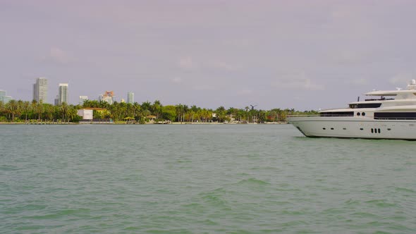 White yacht floating in the bay