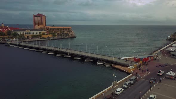 Passing over the famous floating bridge of Curacao looking onto the van der Valk Plaza Hotel