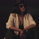 Woman Sitting in Hat and Glasses - VideoHive Item for Sale
