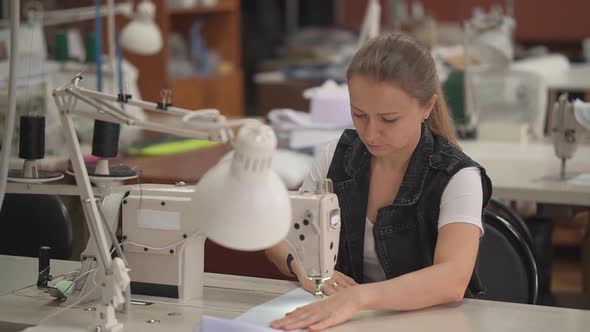 Girl at the Sewing Machine