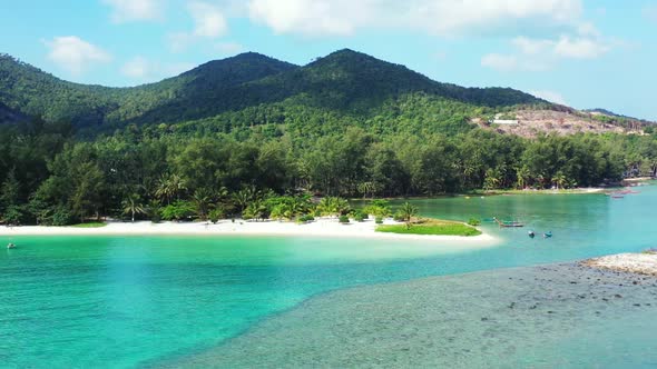 Aerial drone view landscape of exotic coast beach trip by blue ocean and white sandy background of j