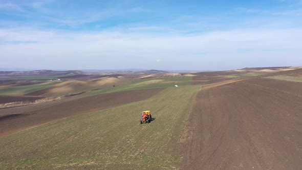 Tractor Plowing Agricultural Land