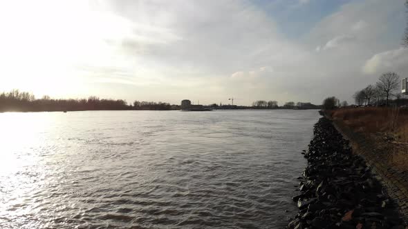 View Of Barge River Oude Maas In Dordrecht and Zwijndrecht, Netherlands - drone shot