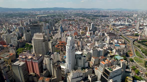 Aerial time lapse landscape of downtown Sao Paulo Brazil. Traffic at famous avenue