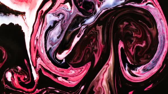 Pink and Black Psychedelic Paints Are Mixed Into Abstract Patterns in White Liquid