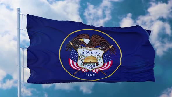 Utah Flag Waving in the Wind Blue Sky Background