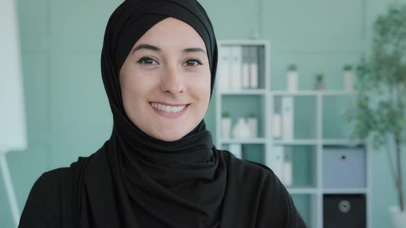 Portrait Arab Girl Islamic Muslim Woman Wearing Black Hijab in Office Looking at Camera Happy