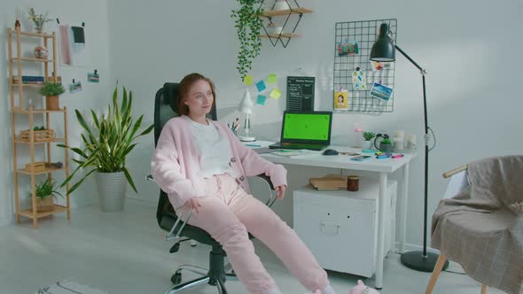 Lazy Female Designer Twists and Turns in Her Chair