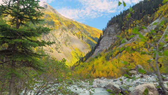 Mountain river in the autumn mountains. A turbulent current. Georgia, Svaneti.