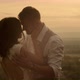 Couple Kissing and Embracing in Sunlight - VideoHive Item for Sale