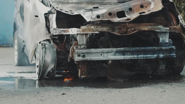 Car Burns After a Road Accident