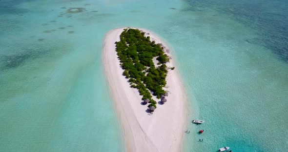 Daytime above abstract shot of a paradise sunny white sand beach and aqua turquoise water background