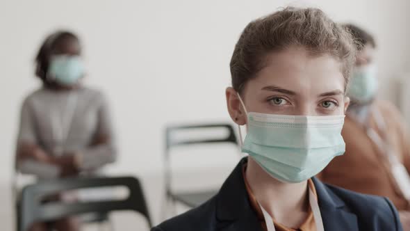 Caucasian Businesswoman in Medical Face Mask