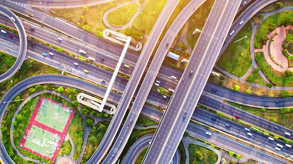 4K : Time lapse Aerial view and top view of traffic on city. Expressway with car lots