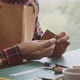 Man Making Leather Wallet at a Workshop - VideoHive Item for Sale