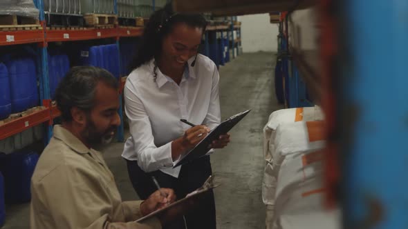 Workers interacting in a warehouse