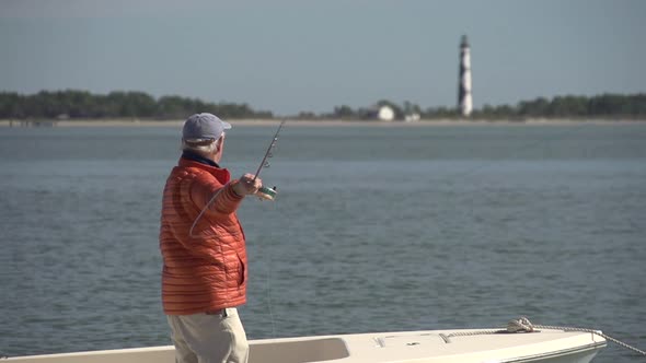 a man fly fishing at cape lookout