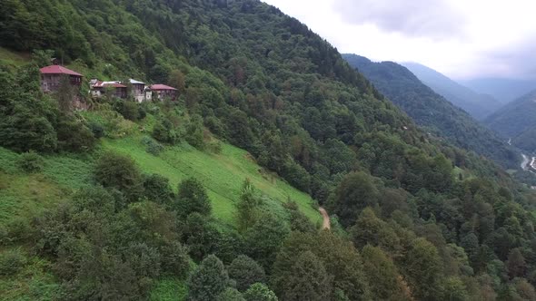 Wooden Village Houses Made With Traditional Architecture in the Forest on the Mountain