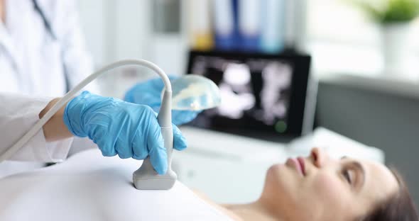 Examination of Female Breast on Modern Ultrasound Medical Equipment