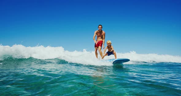 Father and Son Surfing
