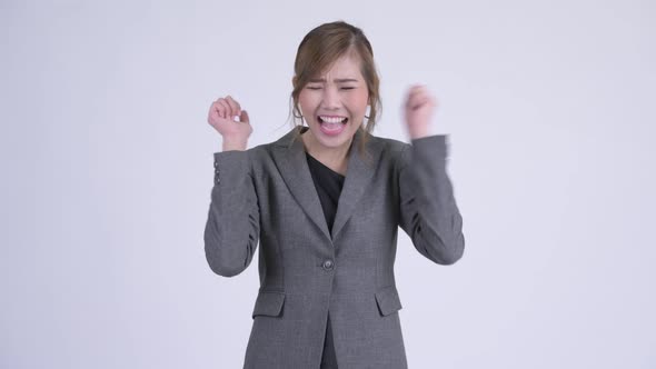 Young Angry Asian Businesswoman Shouting and Screaming