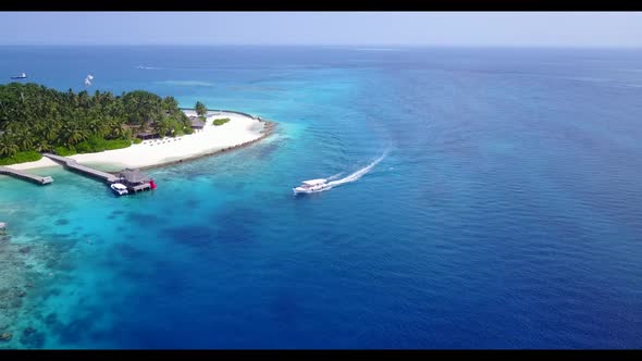 Aerial tourism of luxury lagoon beach adventure by clear lagoon with white sandy background of adven