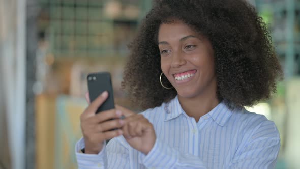 African Woman Using Smartphone 