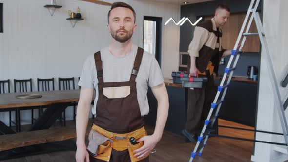 Handyman Posing for Camera Inside Clients House