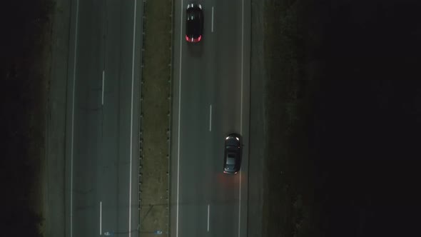 Gray Car Parking on Country Road in Forest in the Night