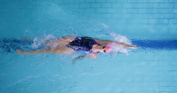 Swimmer training in a swimming pool