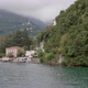 Sailing Past a Village on Lake Como on a Cloudy Day - VideoHive Item for Sale