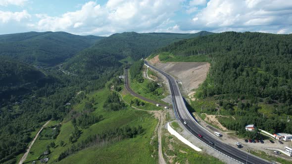 The Baikal Serpentine Road Aerial View of Natural Mountain Valley with Serpantine Road TransSiberian