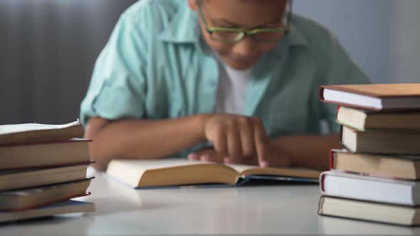 Smart Afro-American Boy Reading Books, Bookworm Kid, Little Nerd, Education