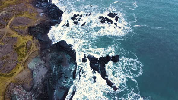 Sea Waves on Beautiful Beach Bird's Eye Aerial View of Ocean Waves Crashing Against an Empty Stone