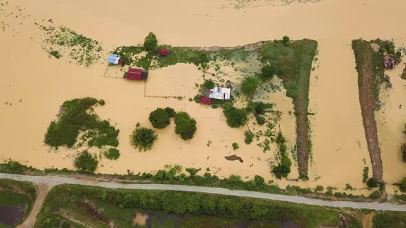 Aerial top down view flood at wooden house