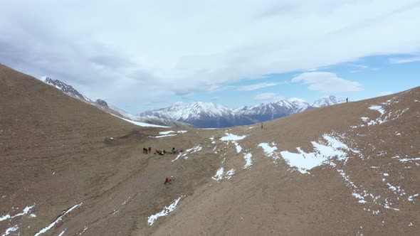 Group of Hikers Resting on the Mukha Pass